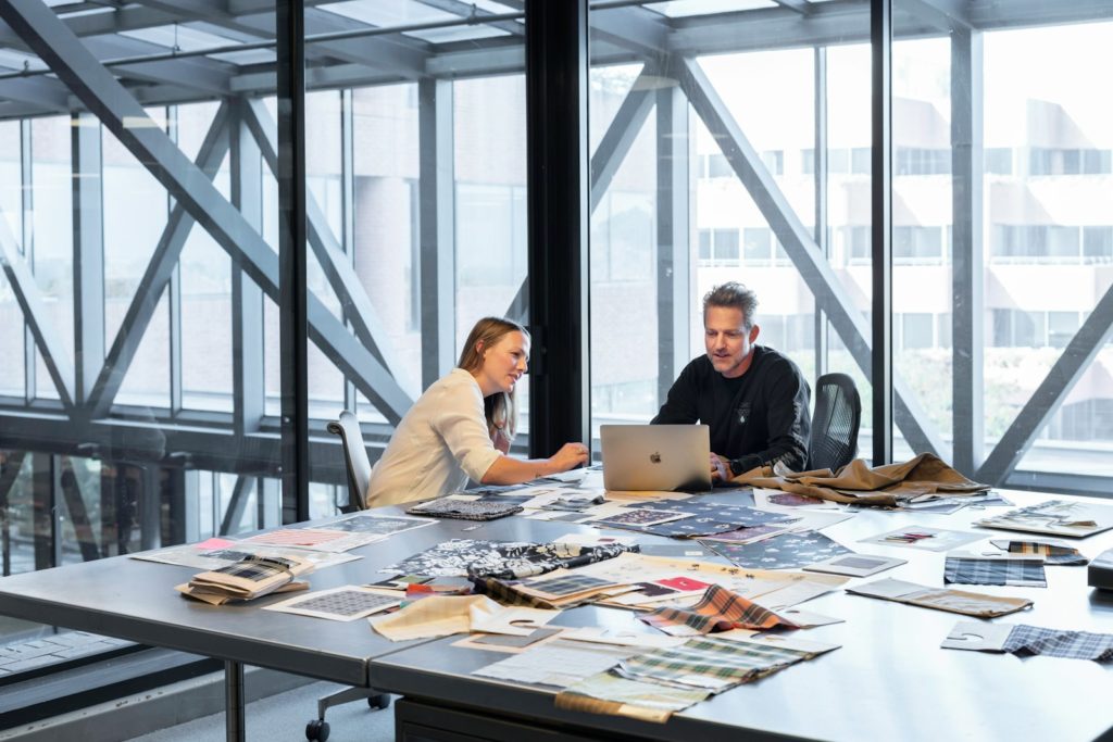 man and woman sitting at table