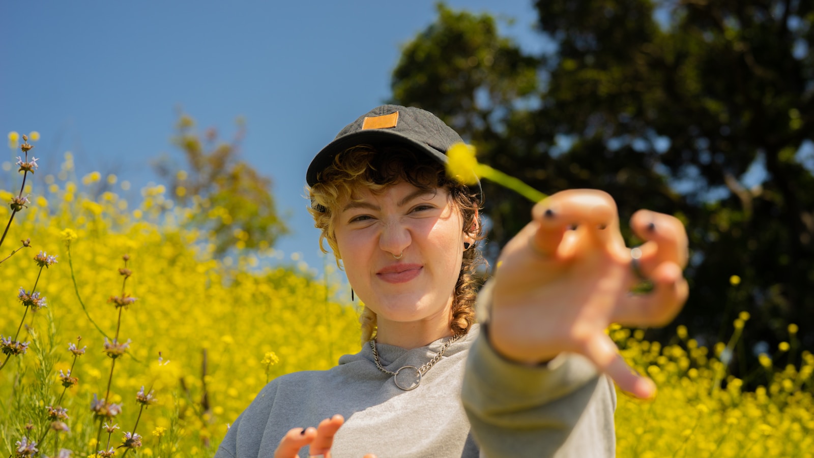 Portrait of a nonbinary autistic person outdoors